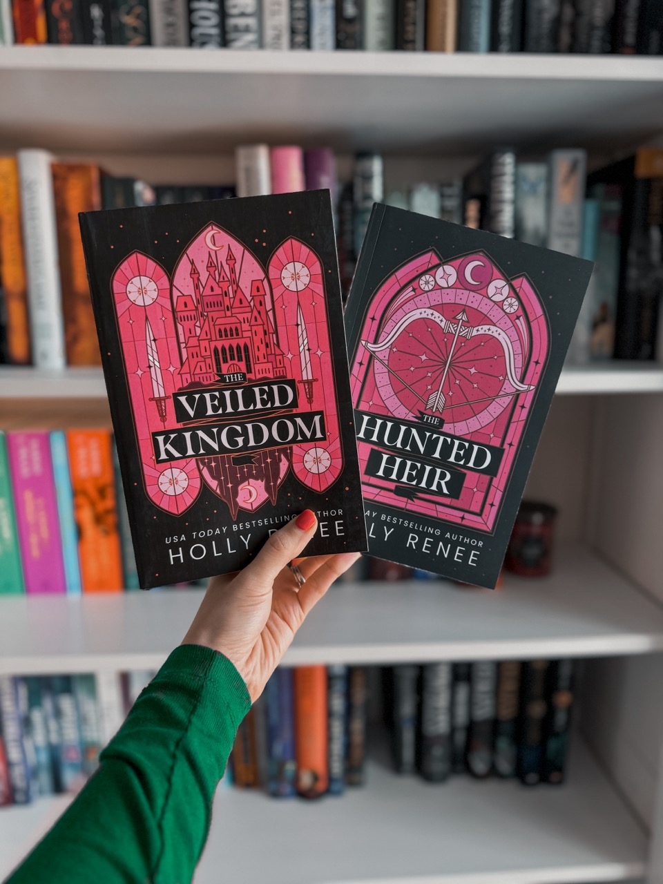 front covers of the veiled kingdom and the hunted heir